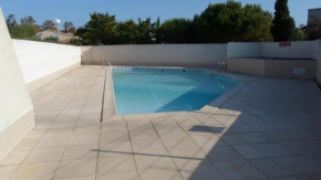 Languedoc Immobilier appartement mezzanine parking privé piscine - CA58